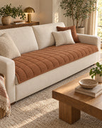 Chestnut Haze: Metro Line Quilted Couch Cover Mat in a warm living room