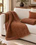 Chestnut Haze: Metro Line Quilted Couch Cover Mat draped over the sofa arm