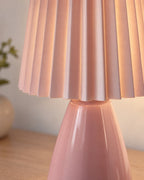 Pink: Close-up of the pleats and glazed finish of the Milkshake Ceramic Cone Nightstand Lamp