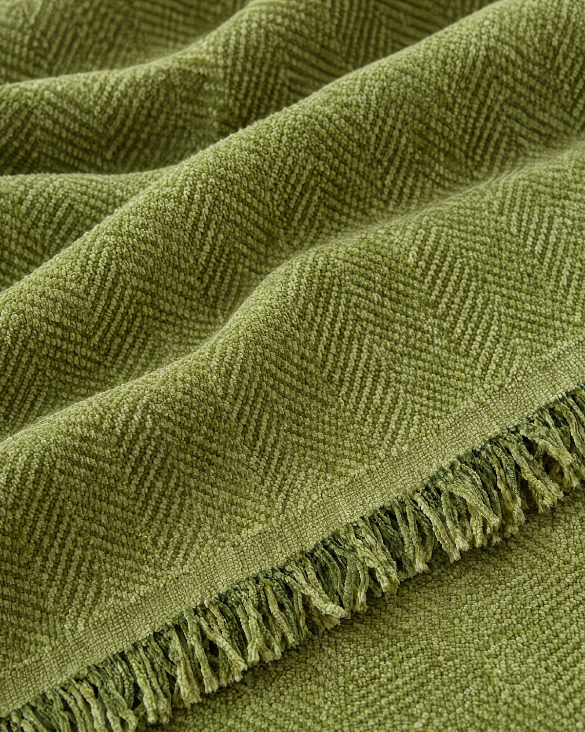 Green: Close-up of the fabric of the Minimalist Sofa Cover
