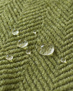 Green: Water droplets beading on the fabric of the Minimalist Sofa Cover