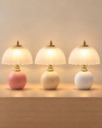 All colourways of the Petal Dome Ceramic Nightstand Lamp side by side: Pink, Cream, White