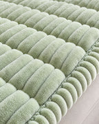 Fresh Meadow: Close-up of the fabric and edge of the Plush Pleated Edges Sofa Cover