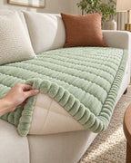 Fresh Meadow: Corner lifted to show the non-slip backing of the Plush Pleated Edges Sofa Cover