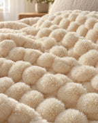 Close-up of the texture of the Popcorn Fleece Throw Blanket, Cream, Jacquard Texture