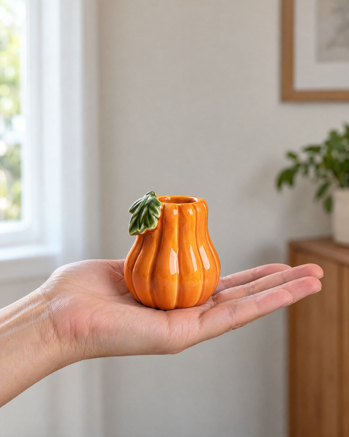 Zucca Pumpkin Ceramic Candle Holder shown at true scale