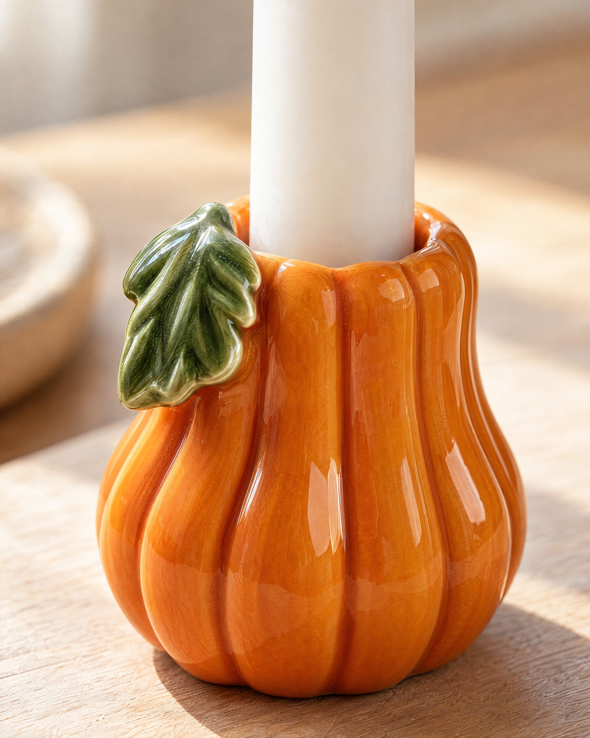 Close-up of the material and finish of the Zucca Pumpkin Ceramic Candle Holder