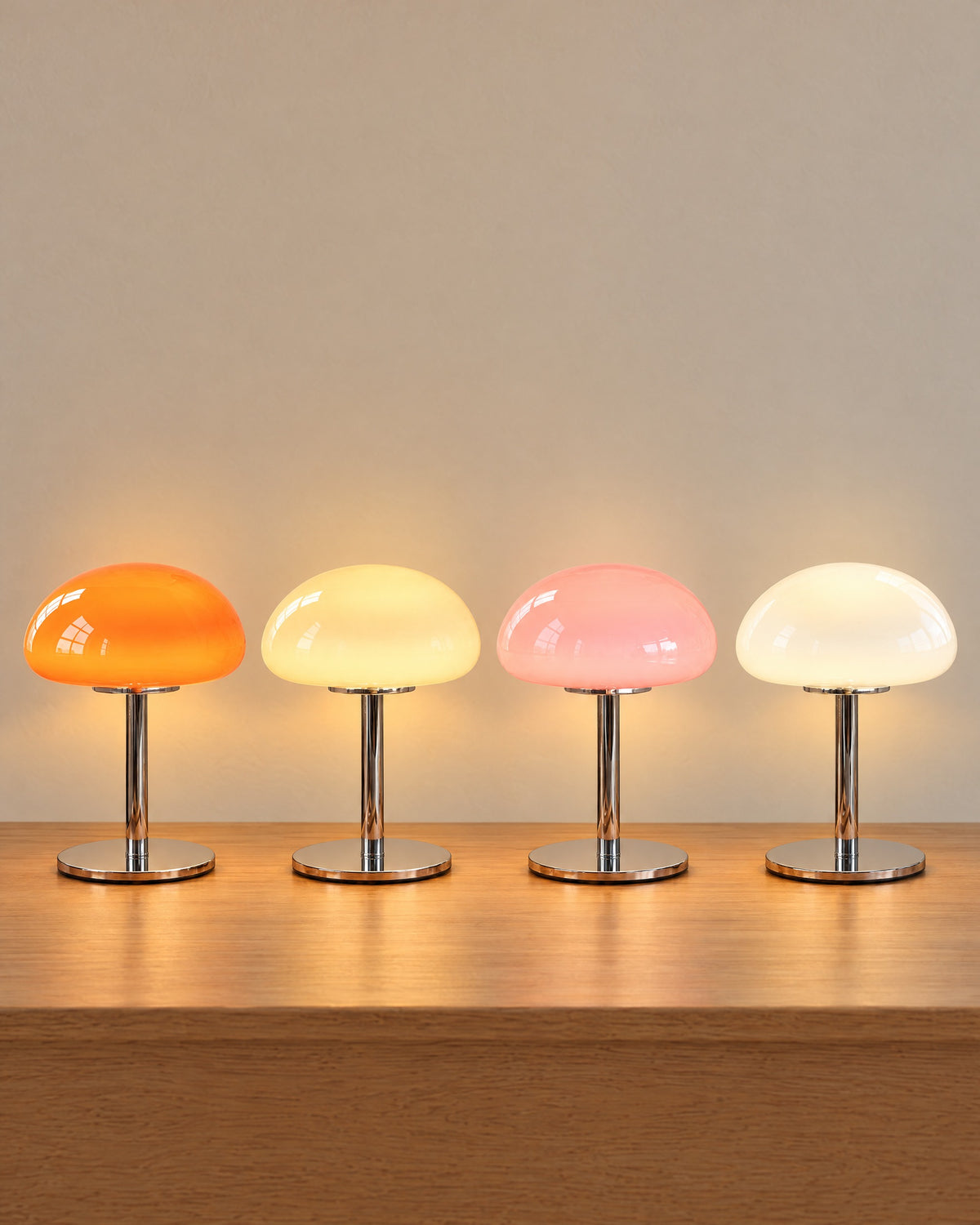 All colourways of the Retro Glass Mushroom Nightstand Lamp side by side: Orange, Cream, Pink, White