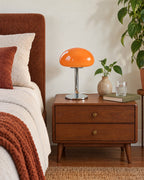 Orange: Retro Glass Mushroom Nightstand Lamp switched off in soft morning daylight