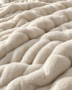 Close-up of the texture of the Ruched Bubble Plush Blanket, Cream, Sherpa Back