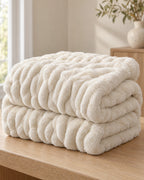Ruched Bubble Plush Blanket, Cream, Sherpa Back folded into a stack, showing its thickness