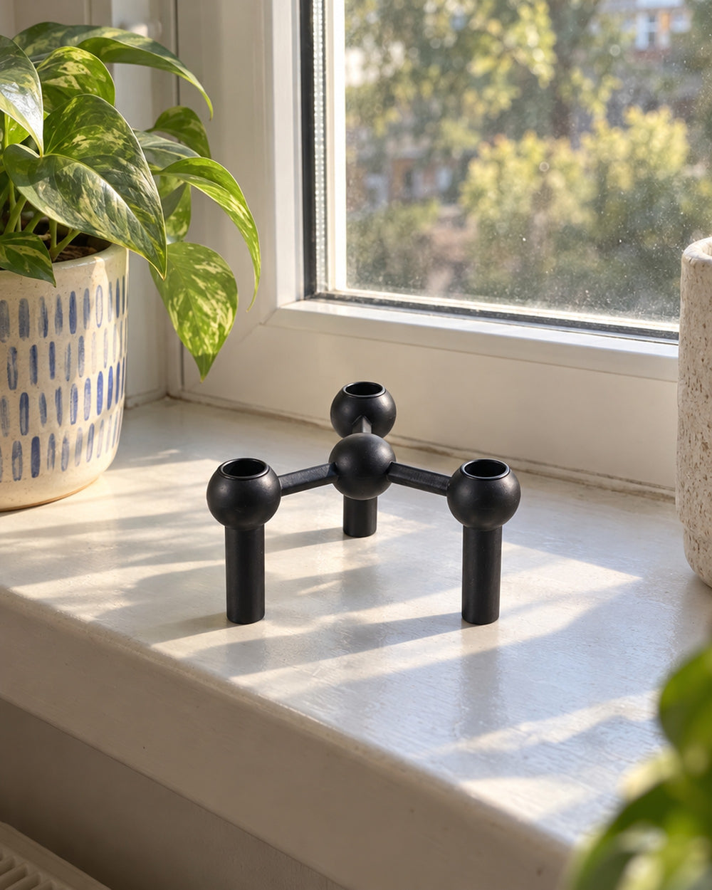Orbit Stackable Metal Candlestick in a real home
