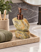Stacked Stone Soap Dispenser, Ceramic, Bronze Pump, 10.5 oz styled on a tray with bathroom accessories