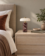 Red Marble: Stone Cordless Marble Nightstand Lamp switched off in soft morning daylight