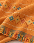 Orange: Close-up of the fabric of the Stylish Boho Sofa Cover