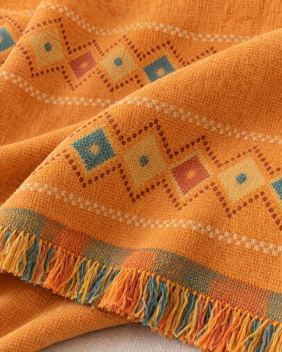 Orange: Close-up of the fabric of the Stylish Boho Sofa Cover