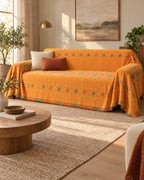 Orange: Stylish Boho Sofa Cover in a warm living room