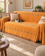 Orange: A cat resting on the Stylish Boho Sofa Cover