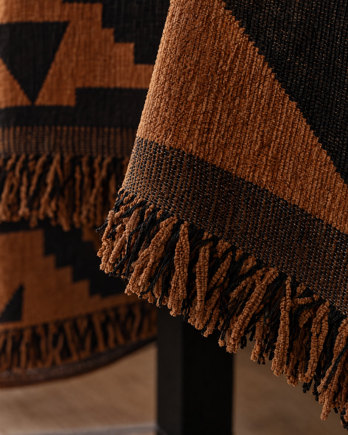 Bold Triangles: Close-up of the edge finish of the Tribal Geometric Chenille Sofa Cover