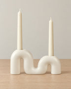 Twist Ceramic Double Candle Holder on a light oak tabletop against a seamless studio backdrop