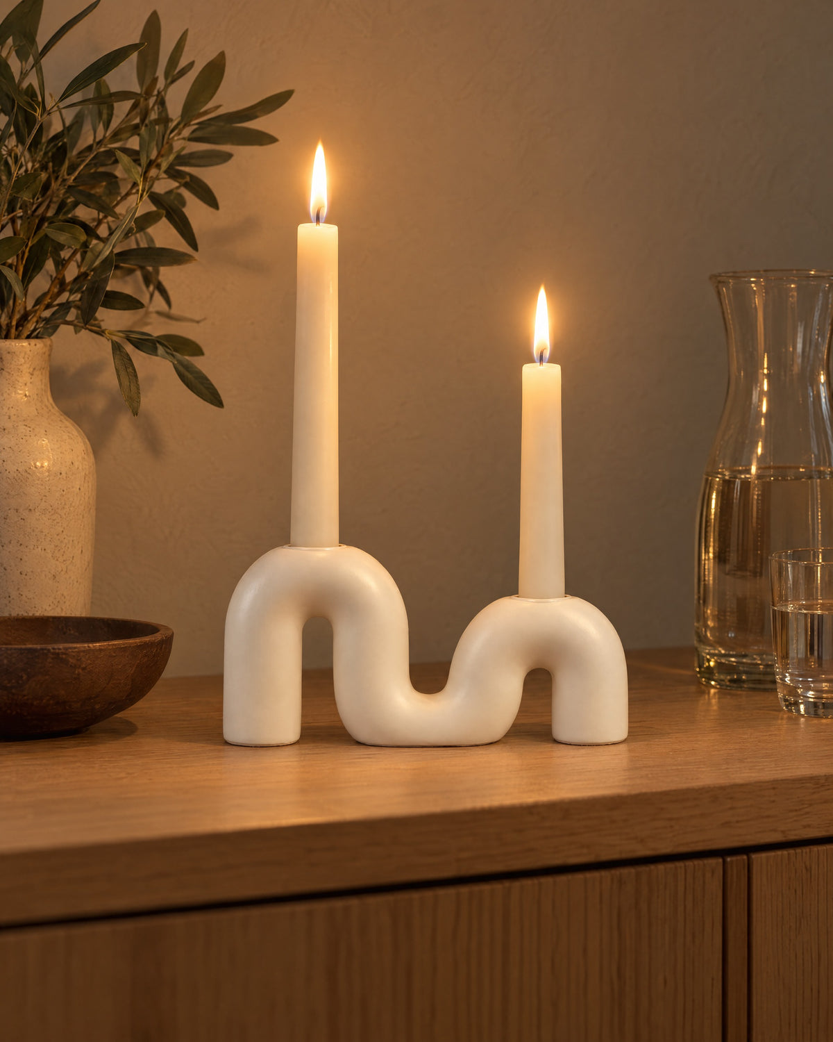 Twist Ceramic Double Candle Holder, lit, in a lived-in evening scene