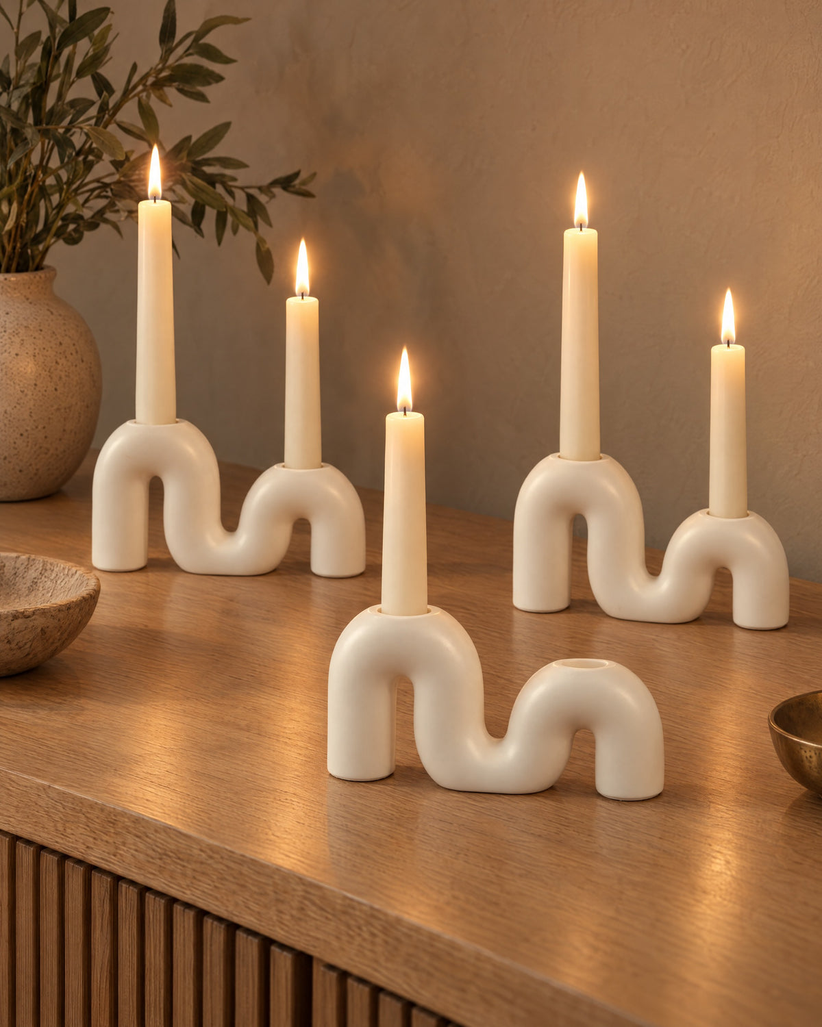 Twist Ceramic Double Candle Holder, three styled together with lit candles