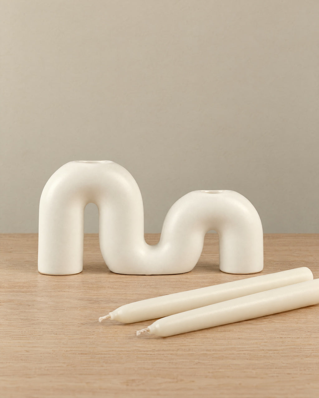 Twist Ceramic Double Candle Holder with the candle type that fits, shown beside it