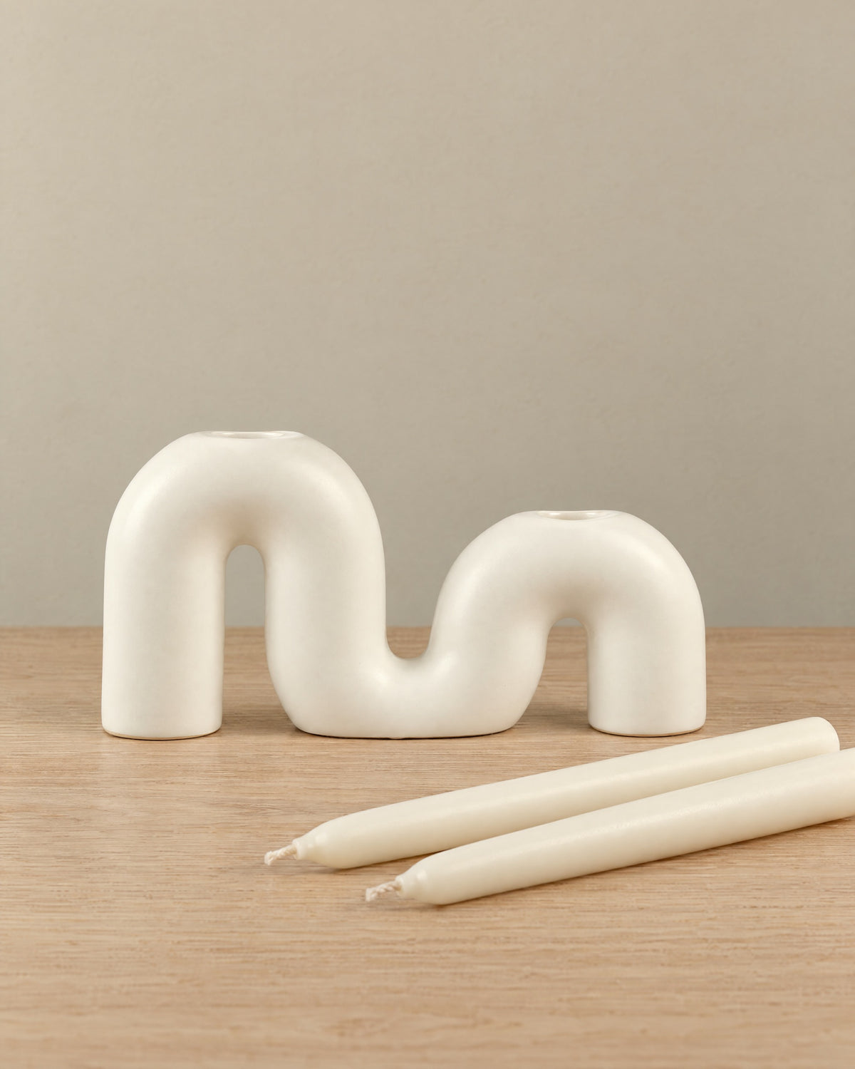 Twist Ceramic Double Candle Holder with the candle type that fits, shown beside it