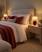Burgundy: Two Vessel Cordless Ceramic Nightstand Lamp lamps flanking a bed at night