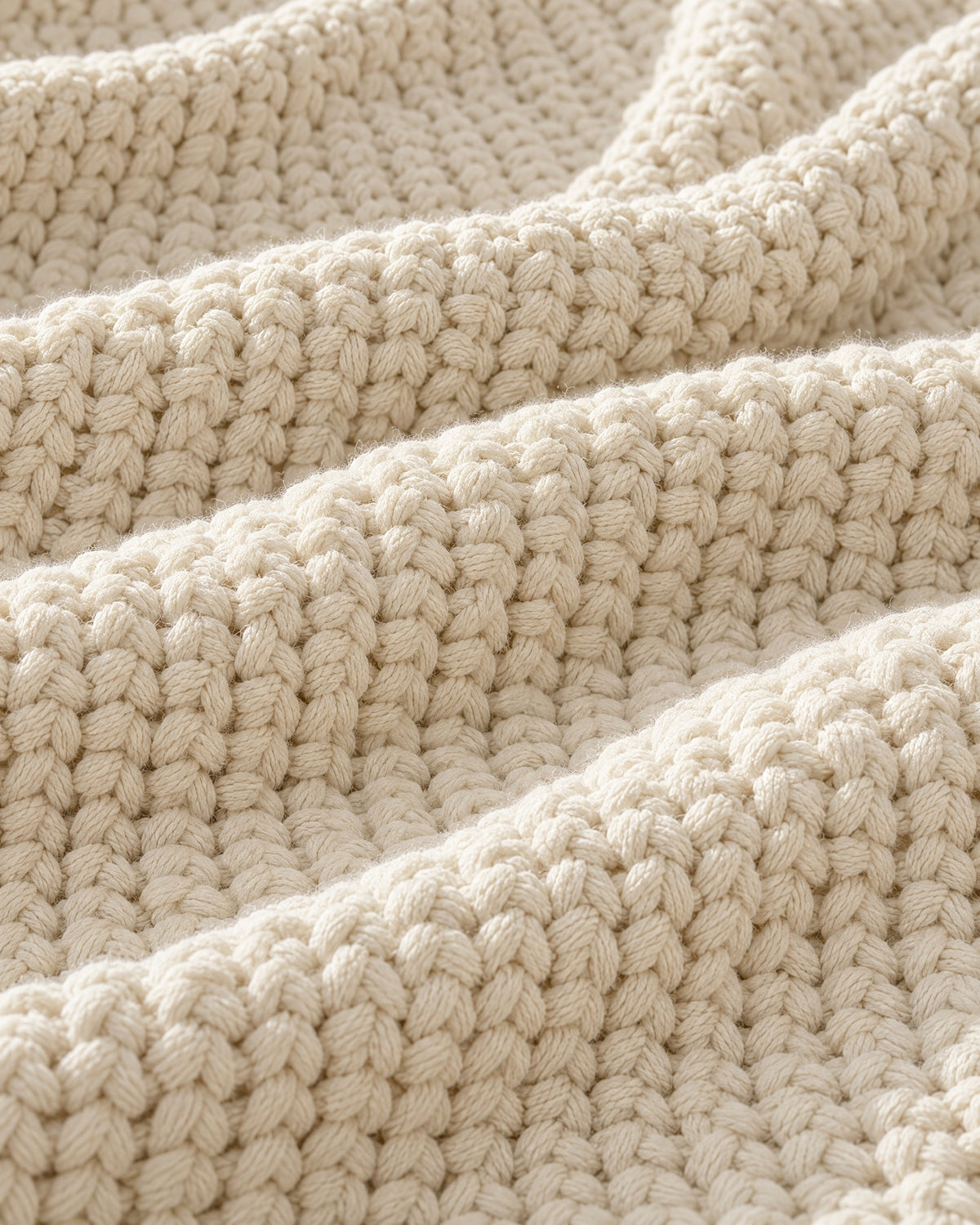 Close-up of the texture of the Waffle Knit Throw Blanket, Cream, All-Season