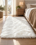 White Faux Sheepskin Area Rug, Washable styled beside a bed