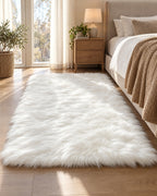 White Faux Sheepskin Area Rug, Washable styled beside a bed