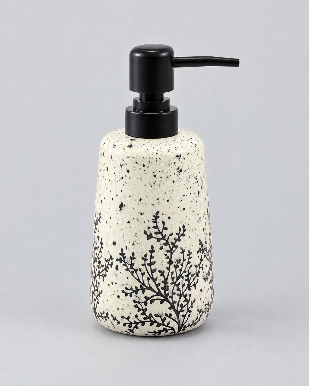 White Soap Dispenser, Speckled Ceramic, Black Pump, 11 oz against a seamless studio backdrop