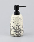 White Soap Dispenser, Speckled Ceramic, Black Pump, 11 oz against a seamless studio backdrop