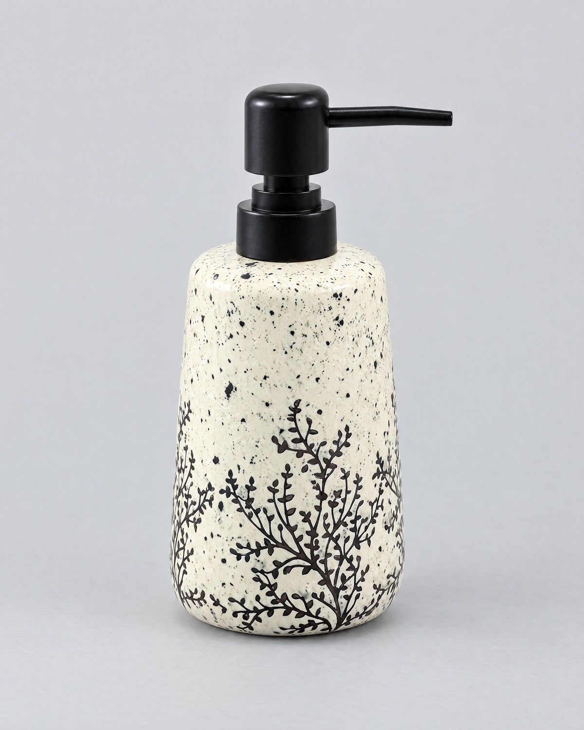 White Soap Dispenser, Speckled Ceramic, Black Pump, 11 oz against a seamless studio backdrop