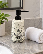 White Soap Dispenser, Speckled Ceramic, Black Pump, 11 oz shown at true scale on a countertop