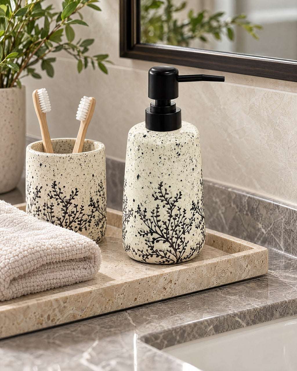White Soap Dispenser, Speckled Ceramic, Black Pump, 11 oz styled on a tray with bathroom accessories